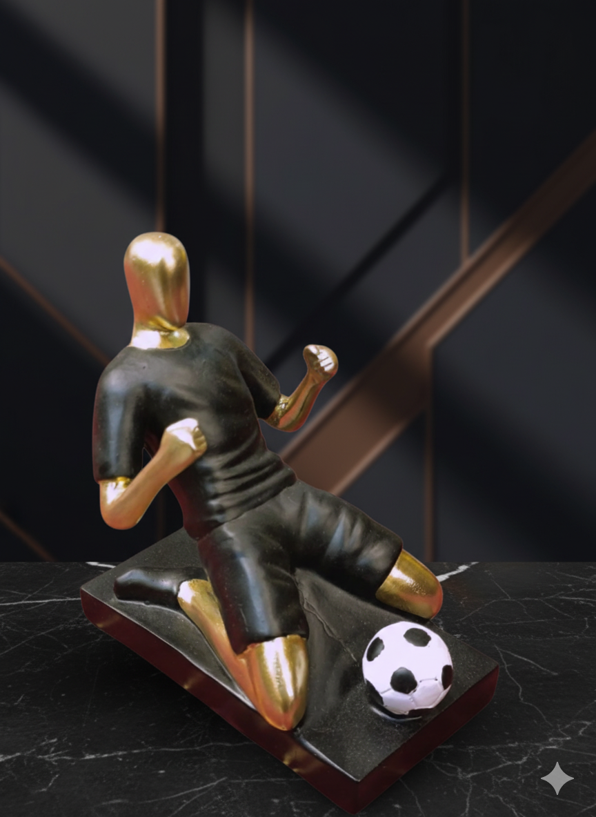 Champion Soccer Player Sculpture
