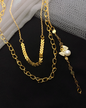 Gold chain necklaces with a pearl pendant 