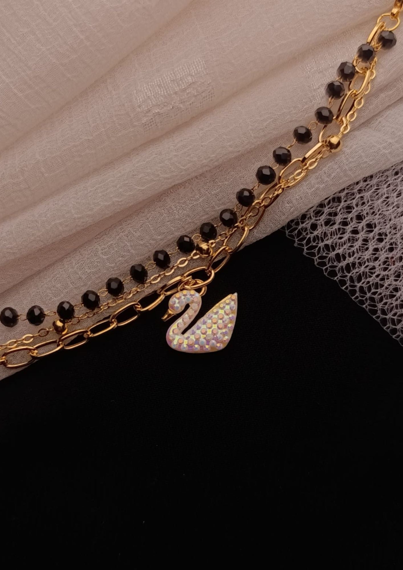 Three-Layered Swan & Bead bracelet