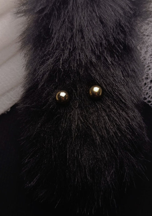 round golden shimmery earrings